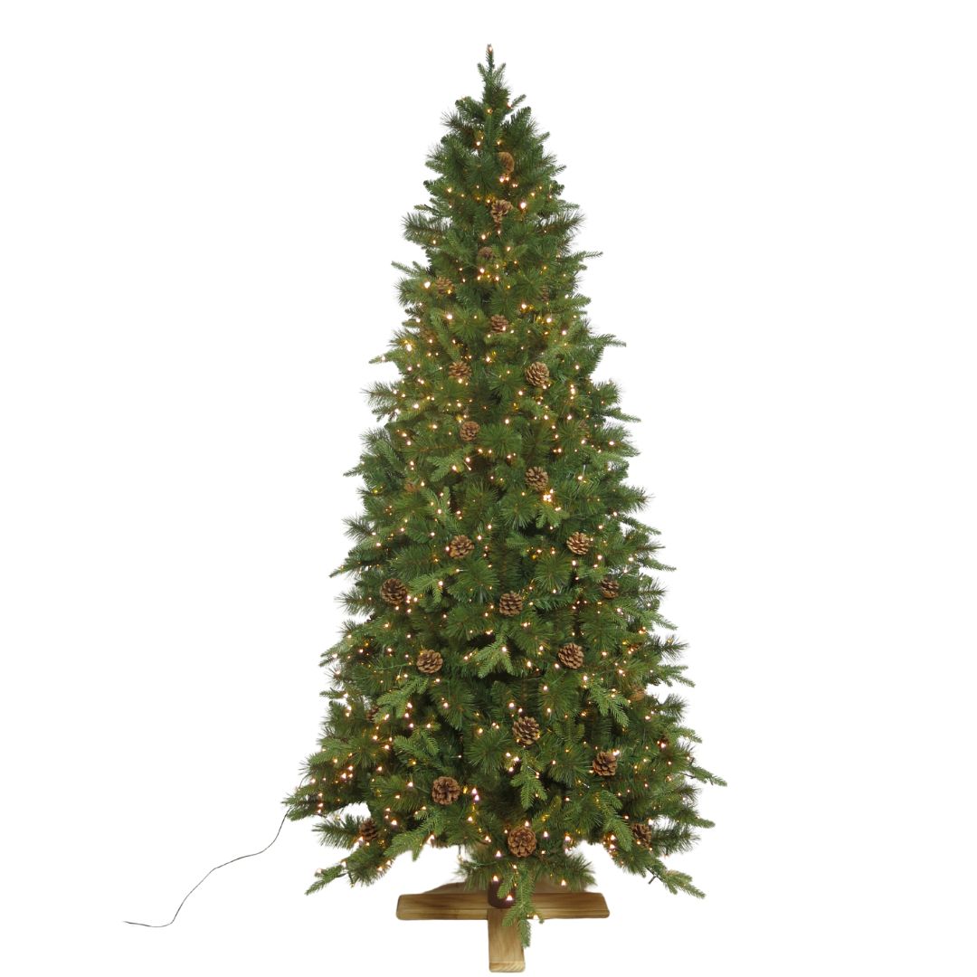Albero di Natale in PE e PVC con pigne decorative, microled a luce bianca calda integrati e base a croce dorata, alto 240 cm.