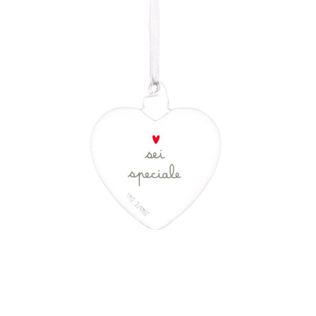 Pallina a forma di cuore in vetro trasparente con cordino bianco e scritta "sei speciale".