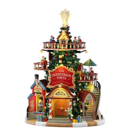 Torre decorata a forma di albero di Natale con negozi, balconate circolari, elfi e decorazioni luminose.