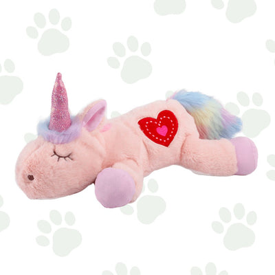 Morbido peluche per cani a forma di unicorno rosa.