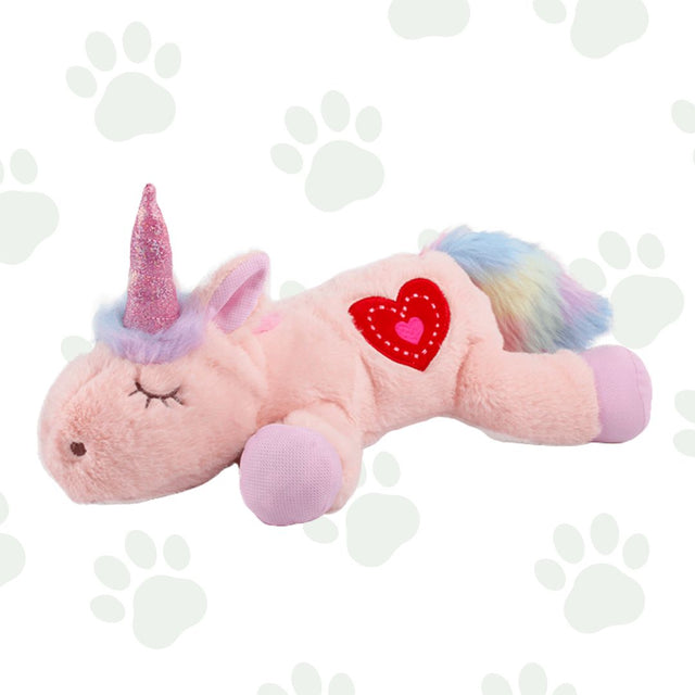 Morbido peluche per cani a forma di unicorno rosa.