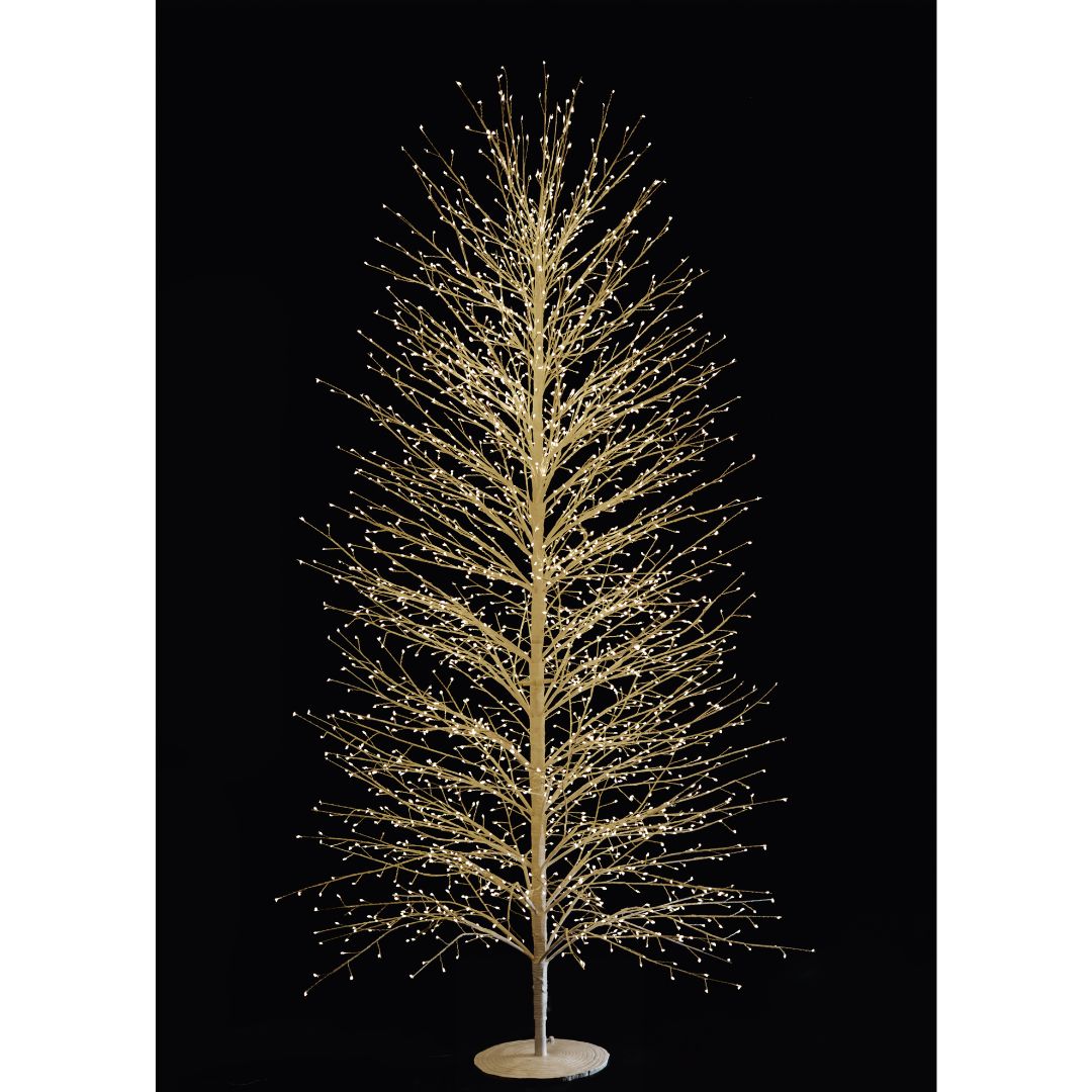 Albero decorativo natalizio bianco con rami sottili illuminato da micro LED bianco caldo su sfondo nero alto 210 cm.