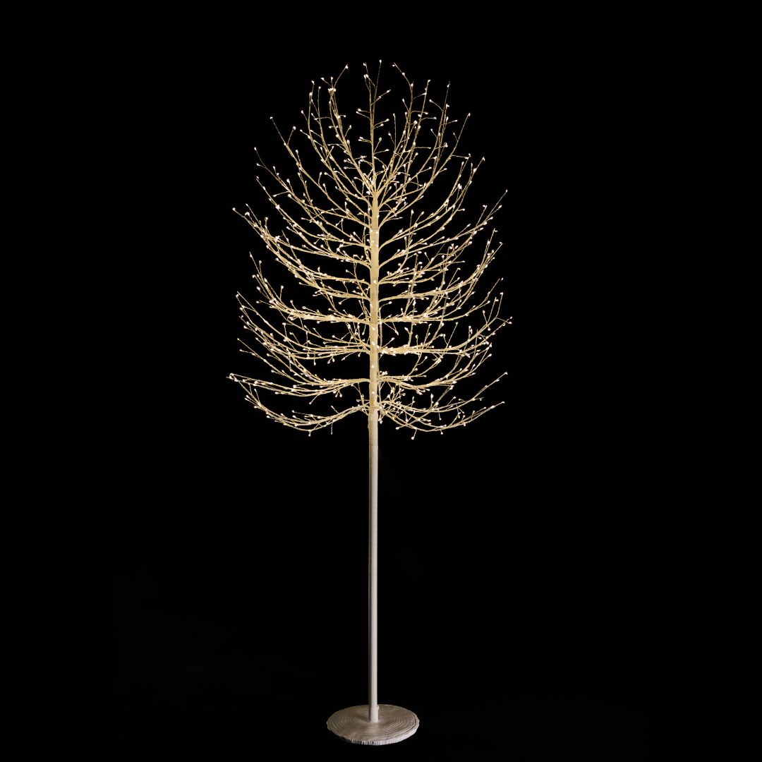 Albero decorativo natalizio bianco con rami luminosi e micro LED bianco caldo su sfondo nero alto 180cm.