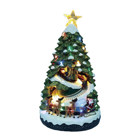 Albero di Natale decorativo illuminato con stella in cima, trenino che gira tra i rami e Babbo Natale con renne e slitta alla base su sfondo bianco.