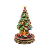 Albero di Natale decorativo illuminato con stella, festoni, pacchi regalo e trenino alla base