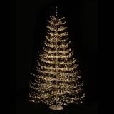 Albero decorativo natalizio alto 240cm con rami sottili illuminato da micro LED bianco caldo su sfondo nero.