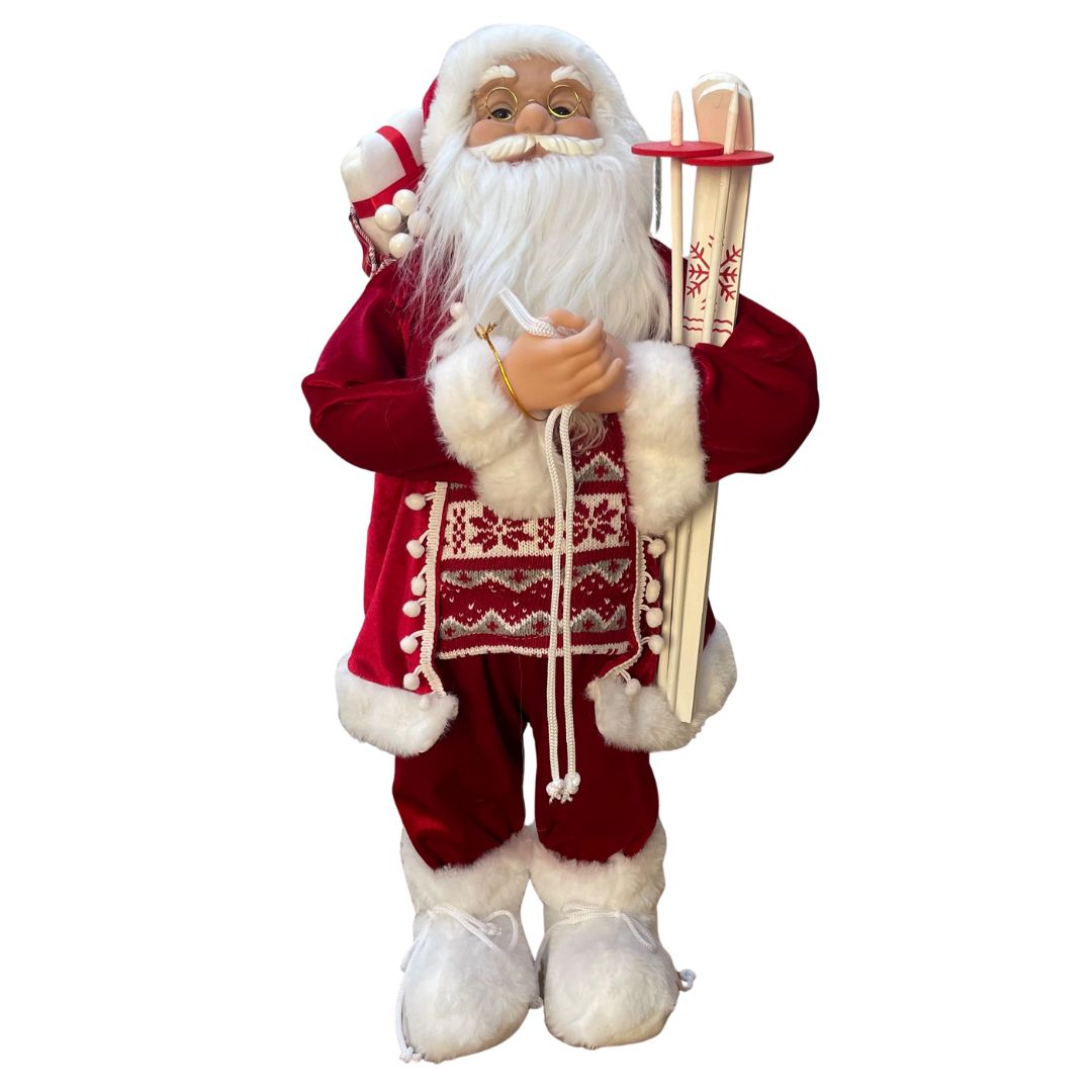 Figura decorativa di Babbo Natale con abito rosso bordato di pelliccia bianca, occhiali dorati, sacco sulle spalle e sci bianchi decorati con fiocchi di neve alto 60cm.