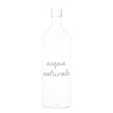 Bottiglia con tappo in vetro borosilicato con scritta bianca "acqua naturale".