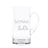 Brocca in vetro soffiato da 1,2 l con scritta in stampatello minuscolo "senza bolle".