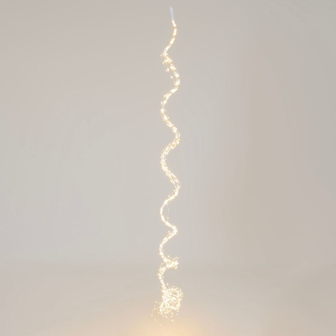 Cascata 900 micro LED 3 m con 15 fili su sfondo grigio.