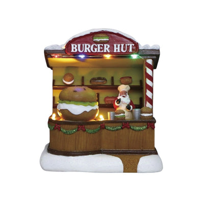 Casetta di vendita di hamburger con Babbo Natale e scritta "Burger Hut" su sfondo bianco.