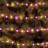 Catena con micro LED bianco caldo alternati a piccole sfere di 1 cm di diametro con luce rosa.