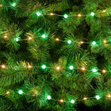 Catena con micro LED bianco caldo alternati a piccole sfere di 1 cm di diametro con luce verde.