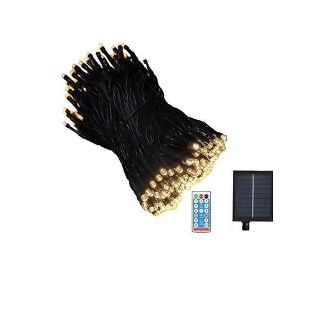 Catena luminosa solare con 500 LED a luce calda, filo nero, pannello solare e telecomando per funzioni e timer.