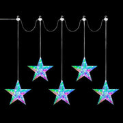 Decorazione luminosa composta da cinque stelle pendenti con superficie trasparente, illuminate da micro LED con effetto iridescente su sfondo nero.