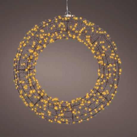 Ghirlanda luminosa da 38 cm accesa, appesa su sfondo marrone, con luci LED calde ben distribuite.