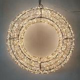 Corona decorativa luminosa con micro LED bianco caldo su struttura metallica circolare diametro 40cm.