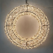 Corona decorativa luminosa con micro LED bianco caldo su struttura metallica circolare diametro 40cm.
