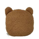Retro del cuscino morbido a forma di orso marrone.