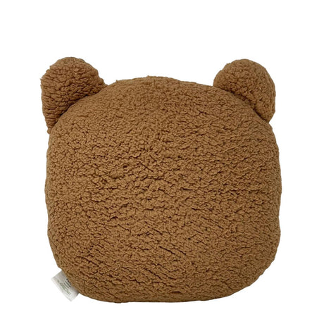 Retro del cuscino morbido a forma di orso marrone.