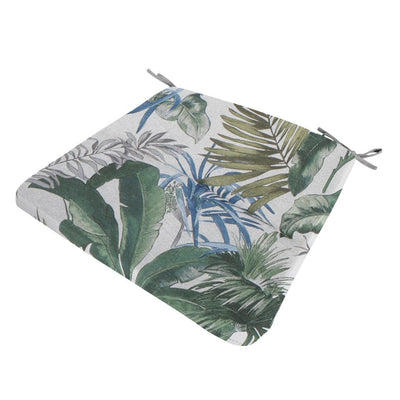 Cuscino per sedia da esterno 40x40cm con fantasia foglie tropicali verdi e dettagli blu su fondo chiaro.
