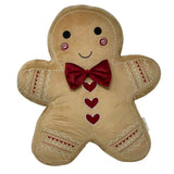 Cuscino a forma di omino pandizenzero con fiocchetto rosso.