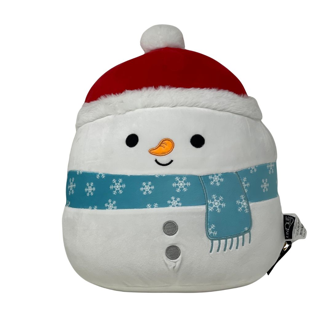 Cuscino a forma di pupazzo di neve bianco con cappello rosso natalizio e sciarpa azzurra.