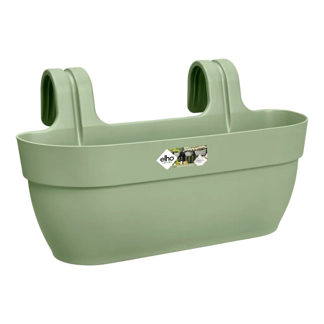 Fioriera da ringhiera in plastica colore verde.