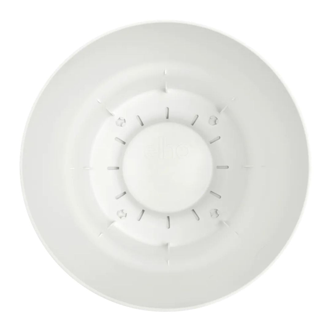 Interno vaso rotondo in plastica bianco con serbatoio integrato.