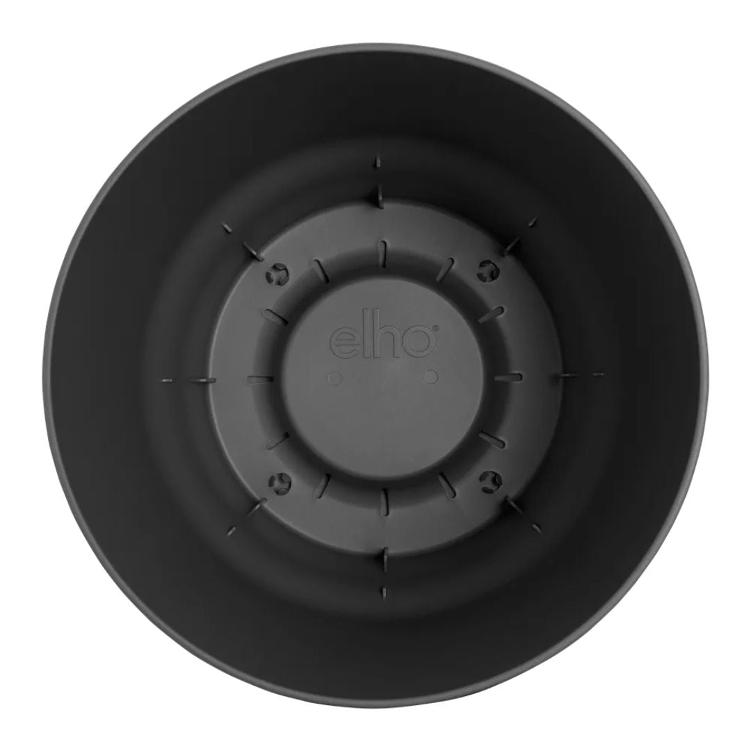 Interno vaso rotondo in plastica nero con serbatoio integrato.