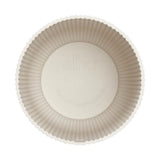 Interno del coprivaso in plastica bianco.