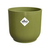 Coprivaso in plastica riciclata verde con motivo a coste e con diametro 22 cm.