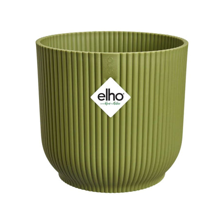 Coprivaso in plastica riciclata verde con motivo a coste e con diametro 35 cm.