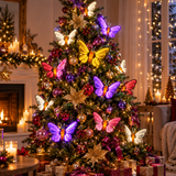 Albero di Natale decorato con farfalle Infinity luminose multicolore, palline, fiocchi e dettagli dorati