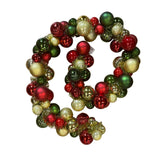 Festone natalizio composto da sfere verdi, rosse e oro, lucide e opache di diverse dimensioni, unite da un filo decorativo.