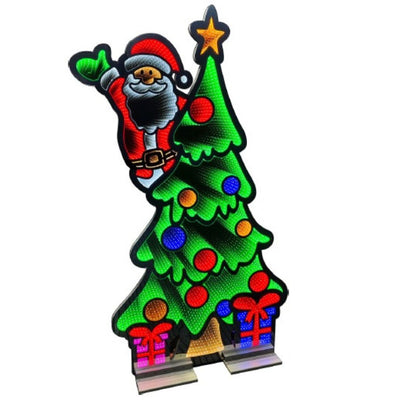Figura luminosa natalizia con Babbo Natale che saluta dietro un albero decorato con palline colorate e pacchi regalo alla base, illuminata da LED con effetto infinity