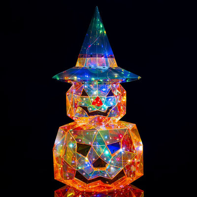 Figura decorativa di Halloween composta da due zucche sovrapposte con volti intagliati e cappello da strega, realizzata con superfici trasparenti illuminate da micro LED effetto iridescente su sfondo nero.