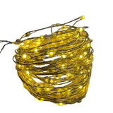 Filo luminoso in metallo argentato con 400 micro LED a luce bianco caldo avvolto.