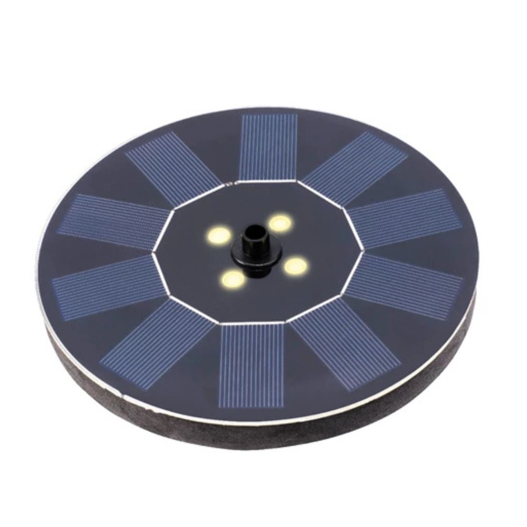 Dettaglio della fontana solare a disco nero con LED integrati e pannelli fotovoltaici