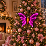 Farfalla Infinity rosa da 66 cm illuminata su albero di Natale decorato con palline, fiocchi e dettagli rosa