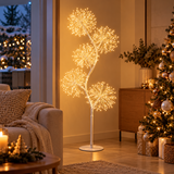 Soffione bianco luminoso a micro LED ambientato in soggiorno accanto all’albero di Natale