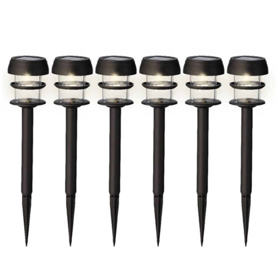 Set di lampade solari a paletto con luce bianca, corpo nero e cupola trasparente, fondo bianco