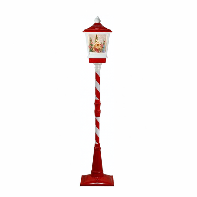 Lampione natalizio rosso e bianco con lanterna illuminata e scena di Natale all’interno