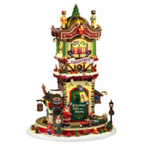 Torre natalizia Lemax decorata con schiaccianoci, campane, regali e albero di Natale, con conto alla rovescia dei giorni fino a Natale e trenino alla base.