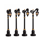 Set di quattro lampioni Lemax per villaggetti natalizi.