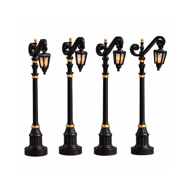 Set di quattro lampioni Lemax per villaggetti natalizi.
