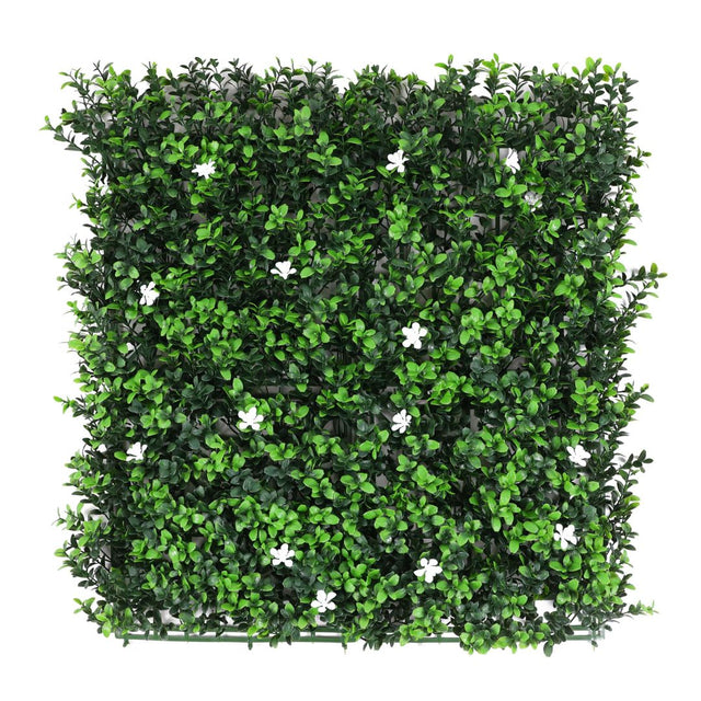 Mattonella di bosso sintetico 50x50 cm con fogliame verde e piccoli fiori bianchi.
