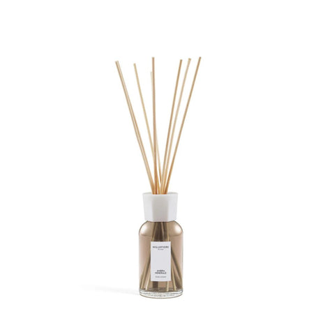 Diffusore con bastoncini per ambiente Millefiori profumazione Ambra Minerale 100ml.