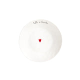 Piatto fondo in grès con scritta nera "tutti a tavola" e cuoricino rosso al centro.