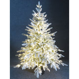 Albero di Natale innevato con microled bianco caldo integrati, alto 120cm su sfondo scuro.